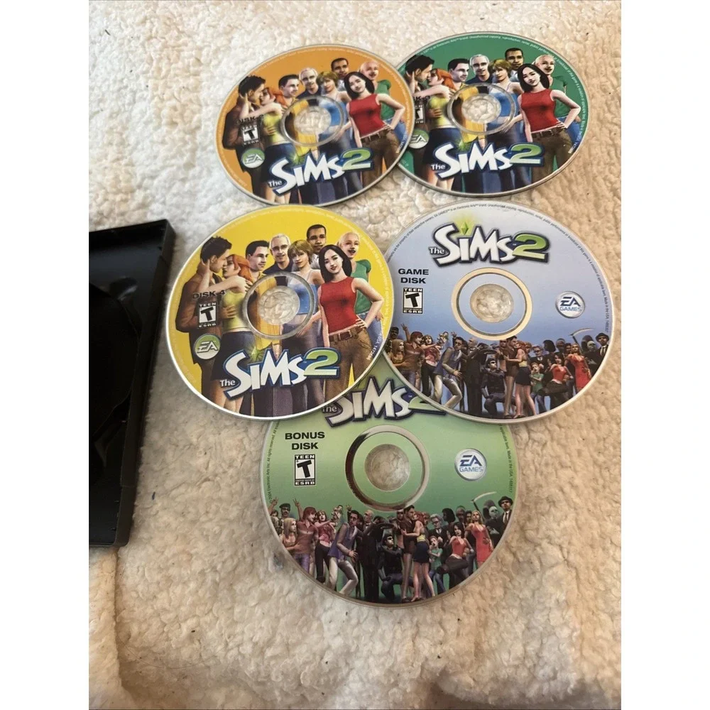 The Sims 2 (PC, 2004 - 5 Discs) Complete No Manual Pre Owned Case Needs Work